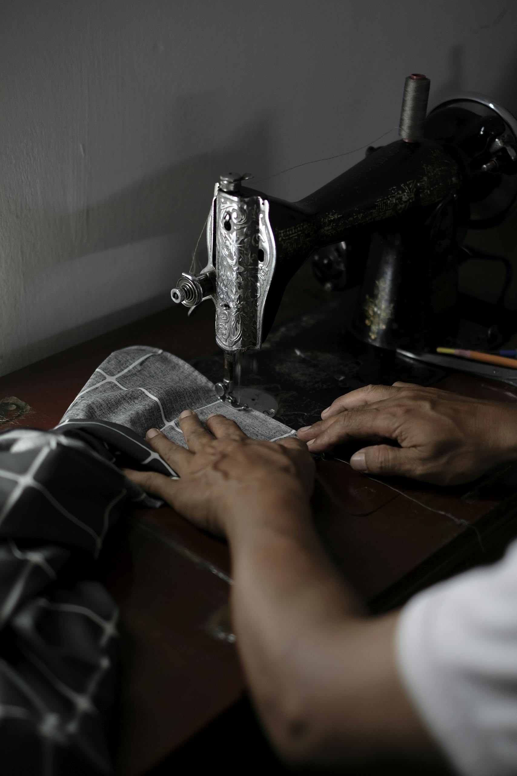 Vibrant street art depicting cartoonish faces and fish on an urban wall.